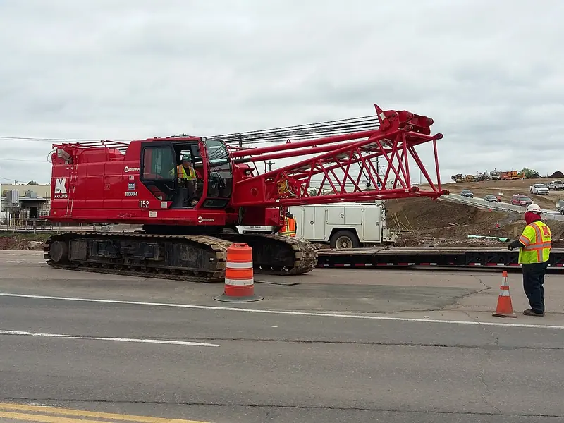 Heavy crawler crane on a highway reconstruction job