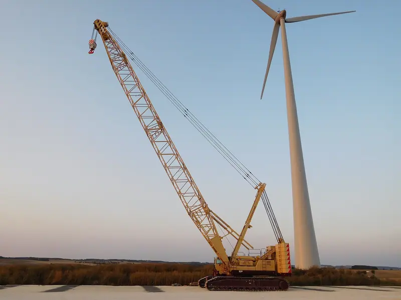 Crawler crane lifting a wind turbine section